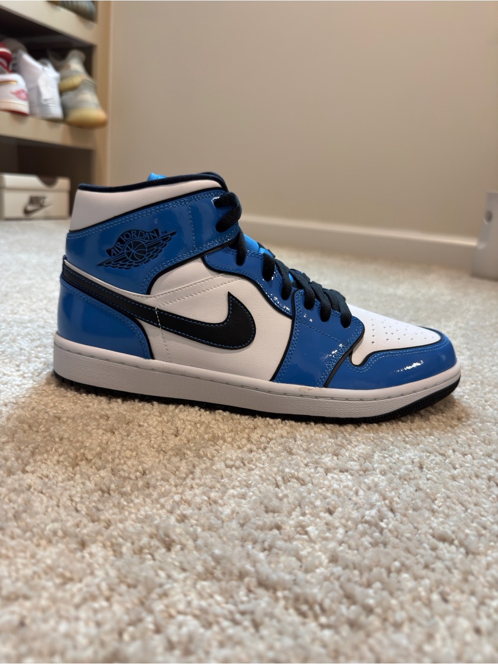 Jordan Men’s High-Top Sneakers in White, Blue & Black